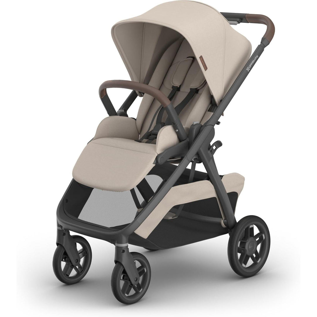 UPPAbaby Kona mid-size stroller in Ada (Sandstone Melange) with reversible toddler seat and extendable canopy