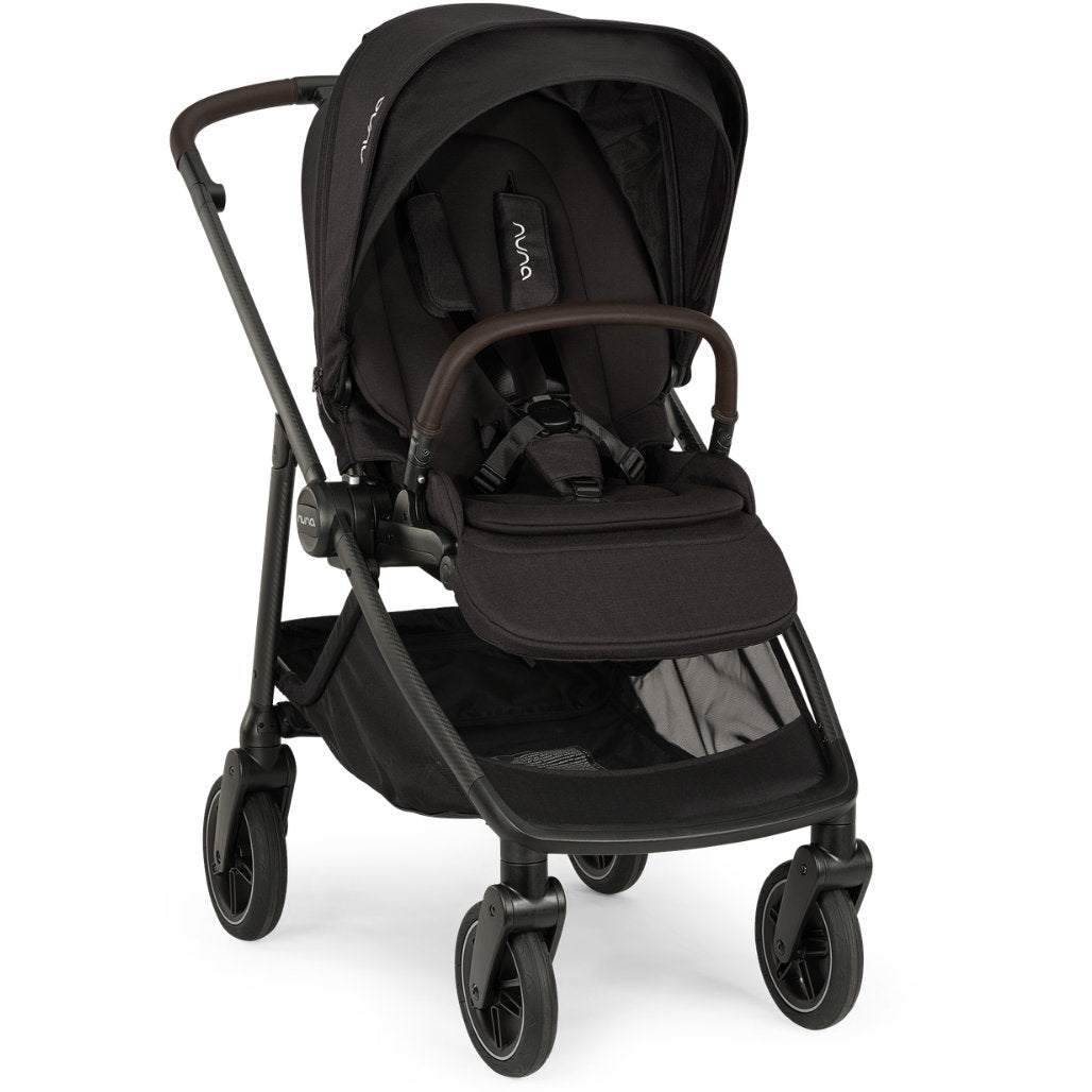Nuna SWIV full-size stroller with button-activated 360-degree rotating wheels and a reversible seat