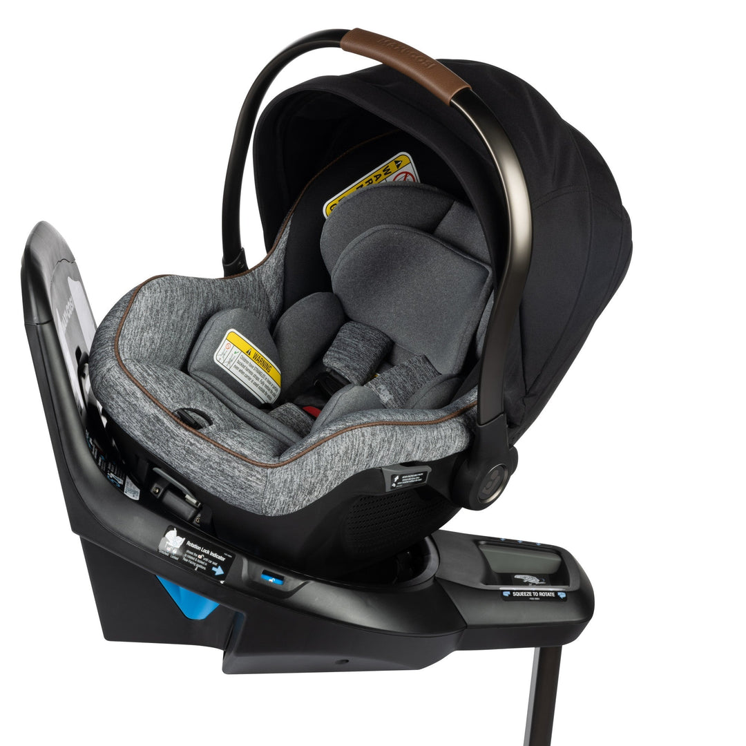 Maxi-Cosi Peri 180° rotating infant car seat — a 180-degree swivel car seat that turns toward the car door for easy loading