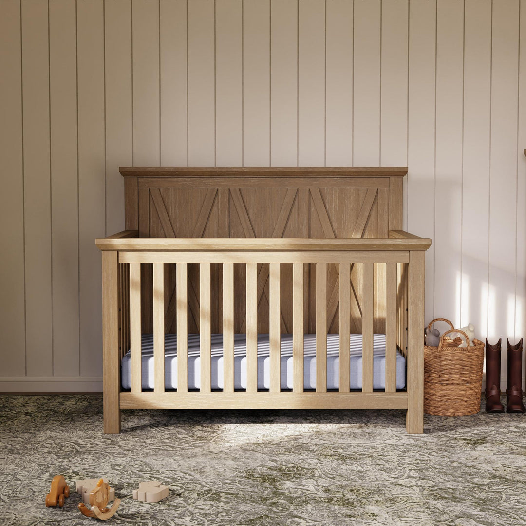 Monogram by Namesake Emory Farmhouse 4-in-1 convertible crib in a modern farmhouse nursery