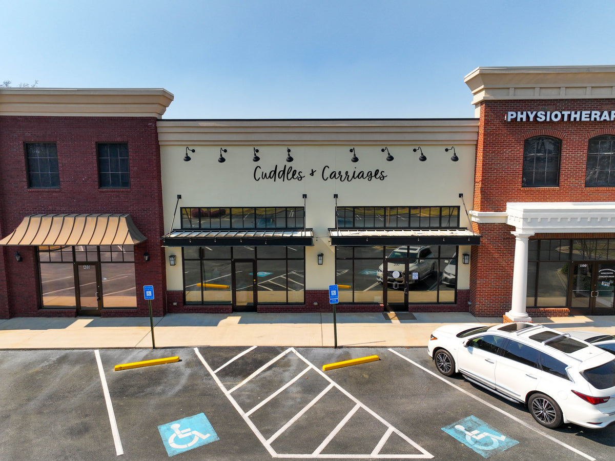 Cuddles & Carriages storefront in Evans, Georgia