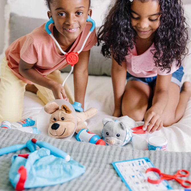 Examine & Treat Pet Vet Play Set by Melissa & Doug - back view