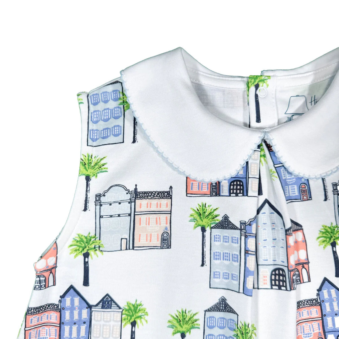 Charleston inspired rainbow row print sleeveless twirl dress for baby and toddler girls. Features a Peter Pan collar with pockets. 