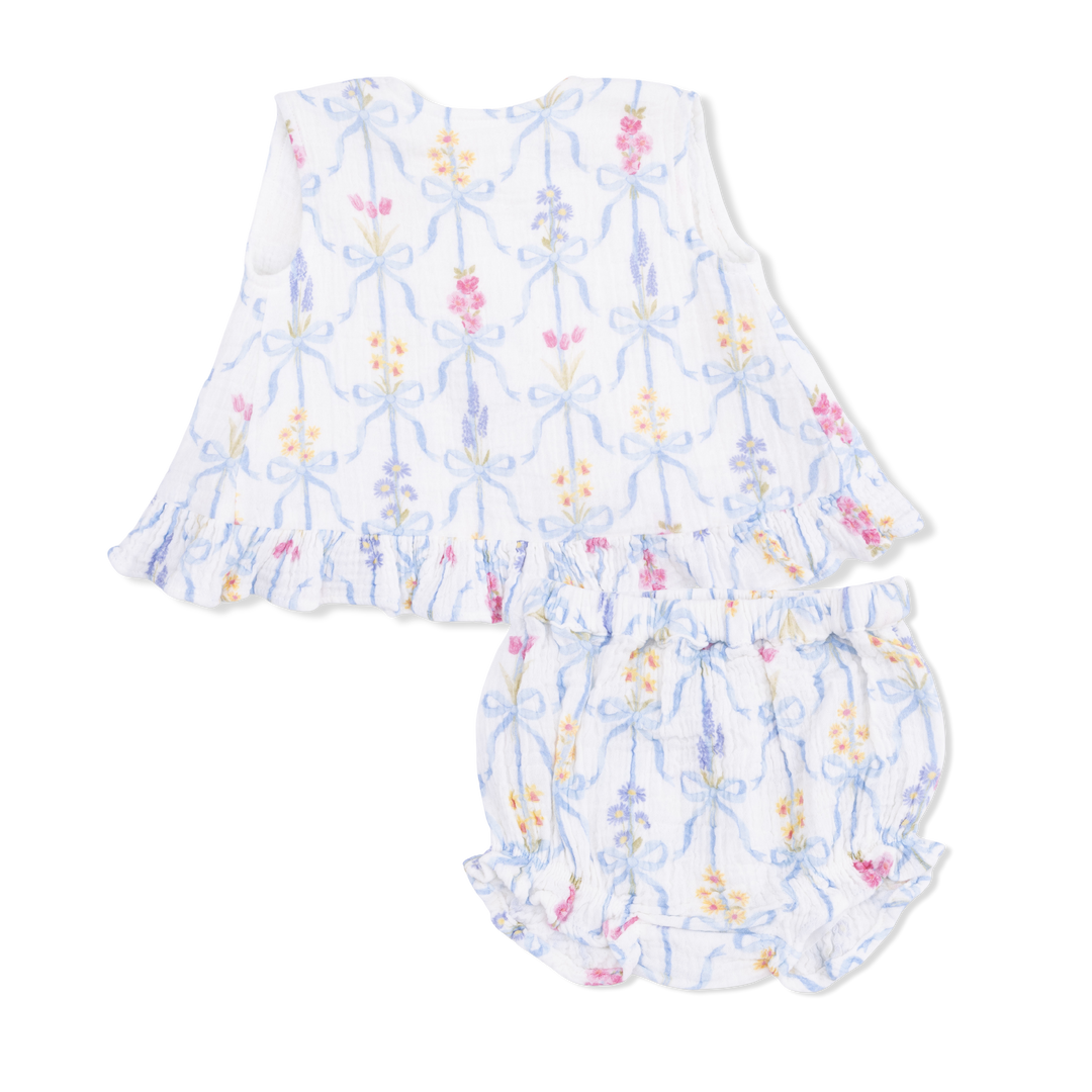 Floral baby romper on a white background