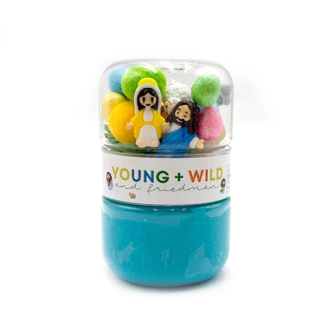 Toy figures in a clear container with a blue base, featuring 'Young + Wild and Friedman' text.