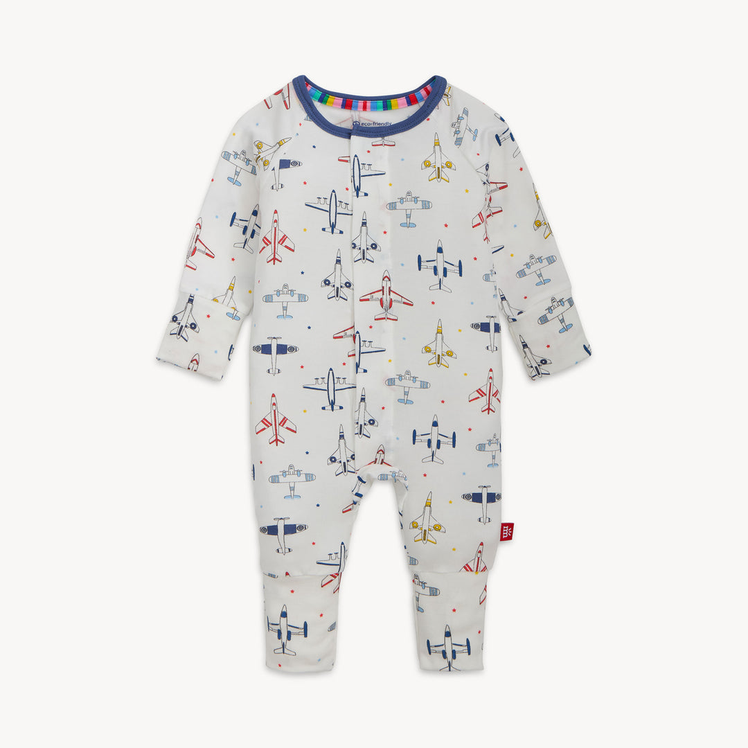 Baby onesie with airplane pattern on a white background