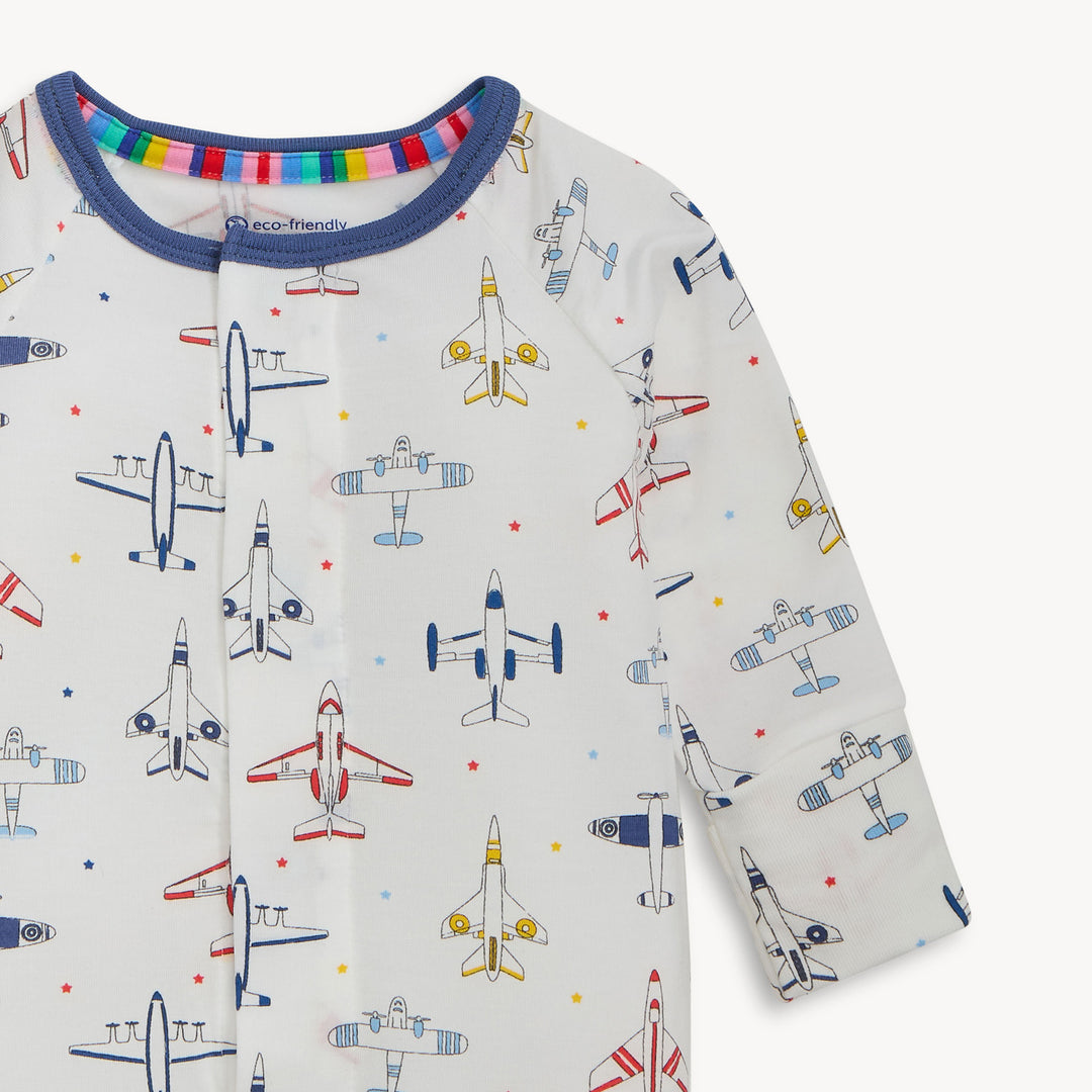 Children's long-sleeve shirt with airplane pattern on a white background