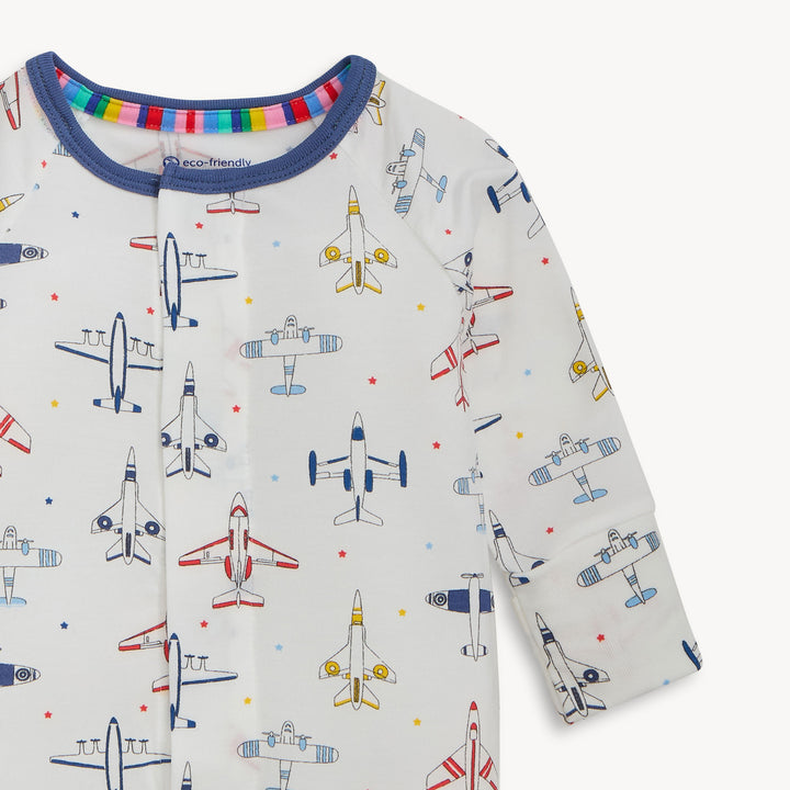 Children's long-sleeve shirt with airplane pattern on a white background